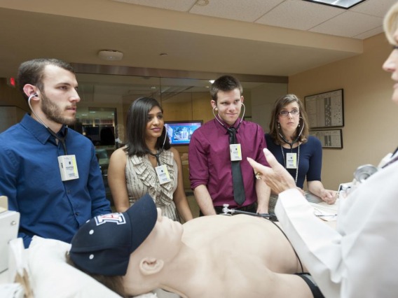 students learning on medical dummy