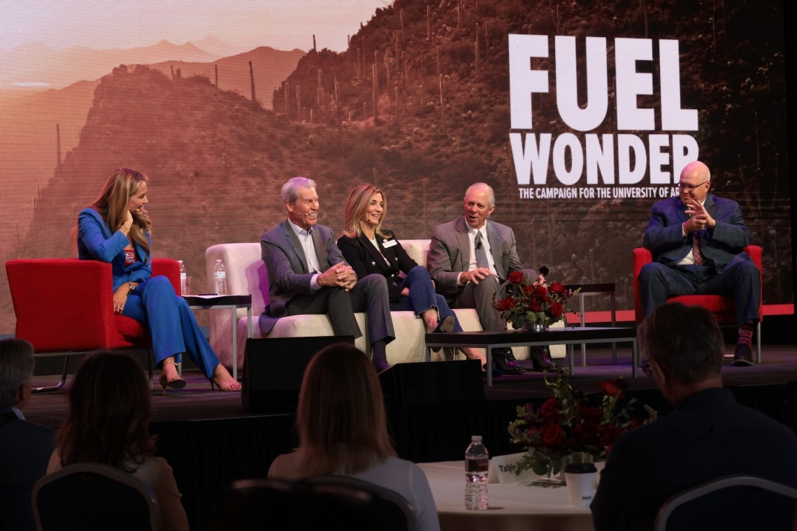 A photograph of Alex Flanagan, UArizona alumna and media agent, with alumnus and former Macy's, Inc. Chairman and CEO Terry Lundgren, alumna and Steele Foundation President and CEO Marianne Cracchiolo Mago, university President Robert C. Robbins and University of Arizona Foundation President and CEO John-Paul Roczniak at the Fuel Wonder campaign launch in the Bear Down Building on Friday.