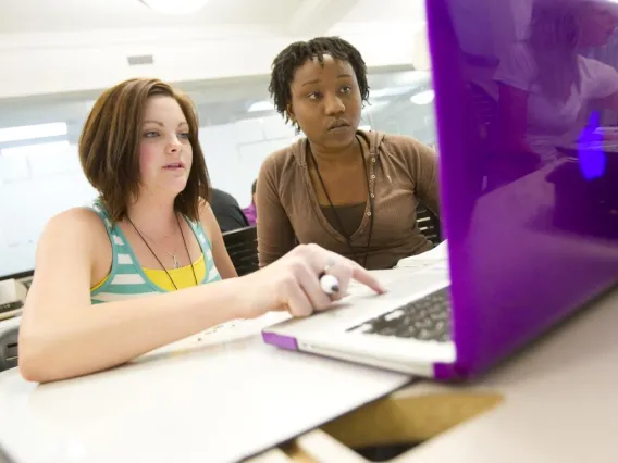 students at laptop