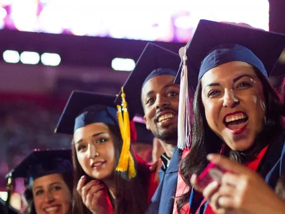 cheering graduates