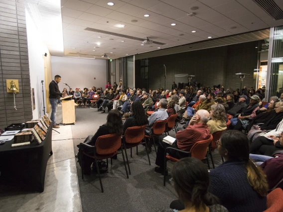 A photograph of poet Terrance Hayes at a reading series event