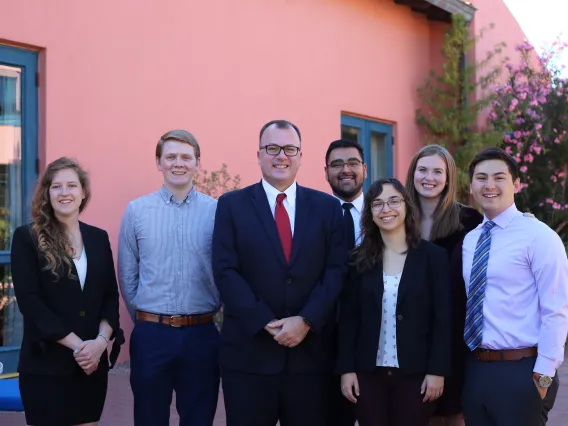 A photograph of Dean with students