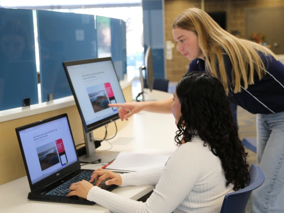 A photograph of students learning at the SALT center