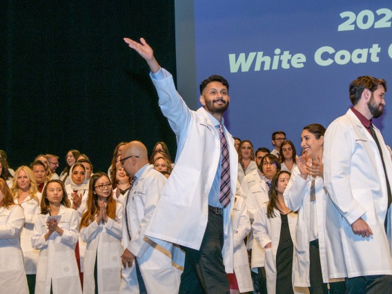 A photograph of students at the 2023 White Coat Ceremony