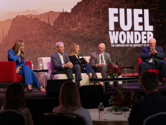 A photograph of Alex Flanagan, UArizona alumna and media agent, with alumnus and former Macy's, Inc. Chairman and CEO Terry Lundgren, alumna and Steele Foundation President and CEO Marianne Cracchiolo Mago, university President Robert C. Robbins and University of Arizona Foundation President and CEO John-Paul Roczniak at the Fuel Wonder campaign launch in the Bear Down Building on Friday.