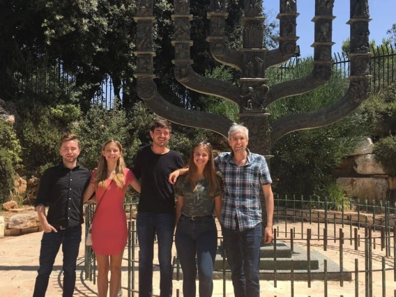 Leonard Hammer and four students standing and smiling 