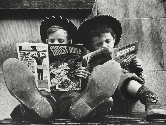 Benn Mitchell, Two Cowboys Reading Comic Books, 1951, Gift in Honor of Benn Mitchell / Benn Mitchell Archive © Center for Creative Photography, Arizona Board of Regents