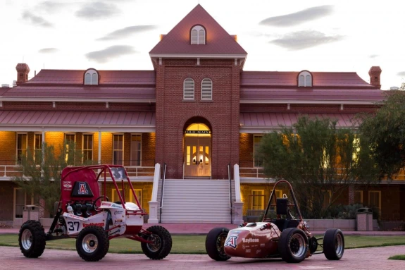 vehicles in front of old main