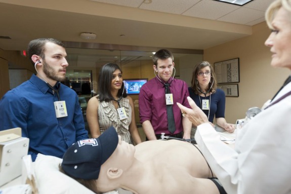students learning on medical dummy