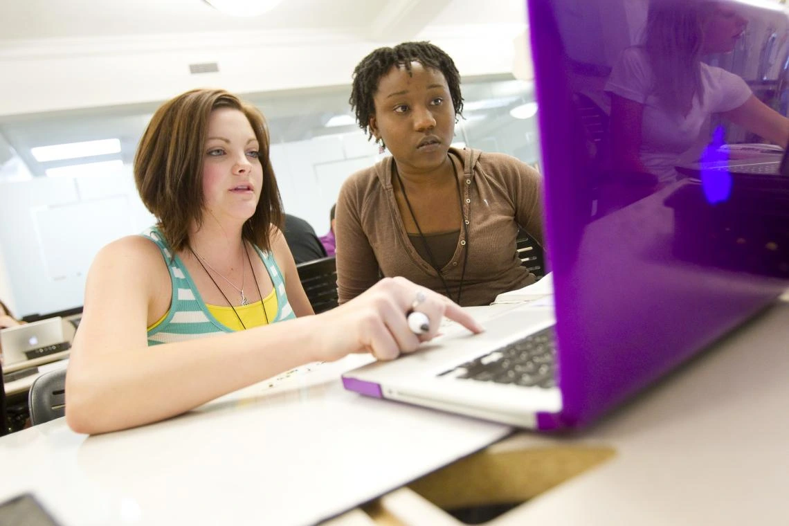 students at laptop