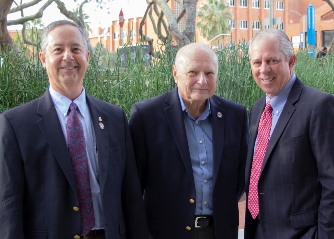 From left: James C. Wyant College of Optical Sciences Dean Thomas Koch, Professor Emeritus James C. Wyant, and university President Robert C. Robbins.