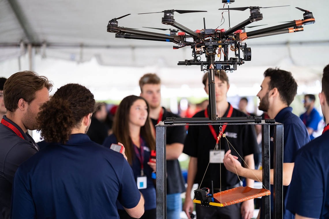 Students engage with drone on UA Mall
