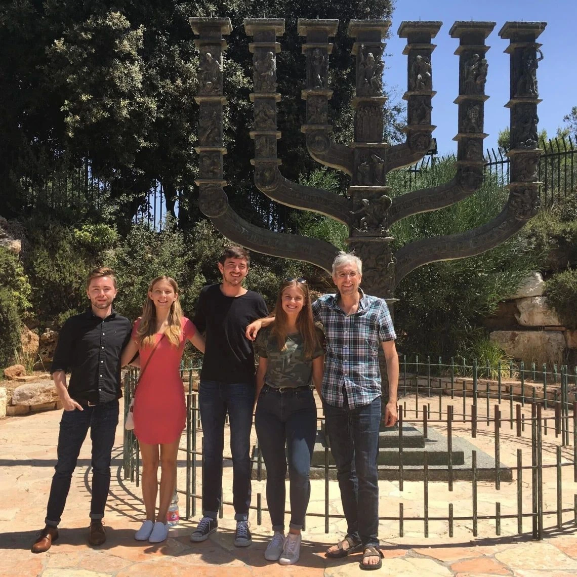 Leonard Hammer and four students standing and smiling 