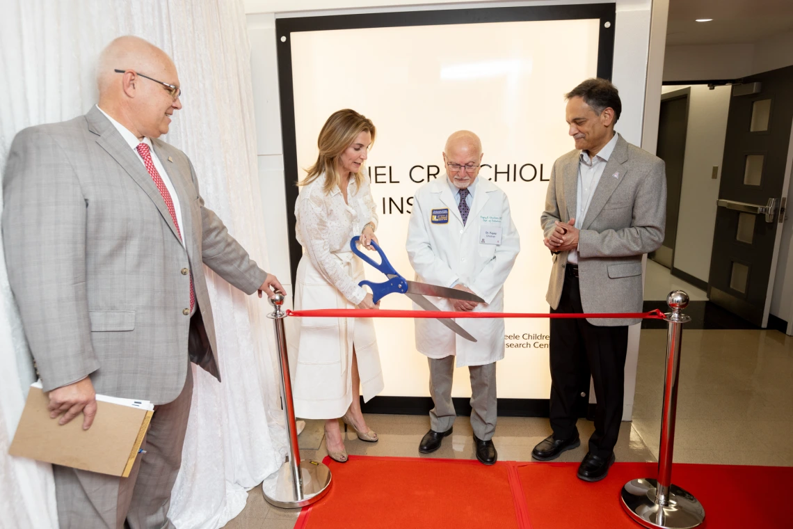 Marianne Cracchiolo Mago, Fayez Ghishan and Suresh Garimella at the Daniel Cracchiolo Institute for Pediatric Autoimmune Disease Research ribbon cutting.