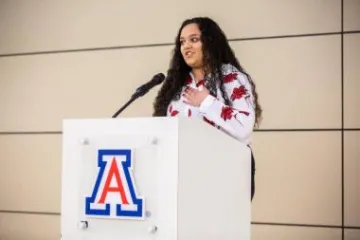 Monique Martinez speaks to the audience.